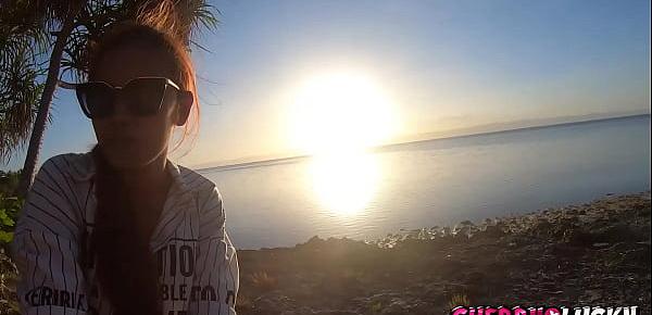 Making perfect blowjob on the beach